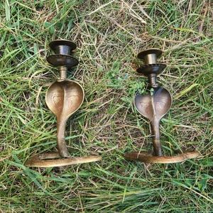 Pair of brass Cobra Candle holders
